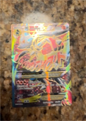 M Rayquaza EX (76), graded 7.5