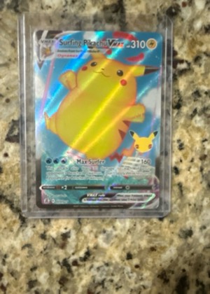 Surfing Pikachu VMAX graded 8