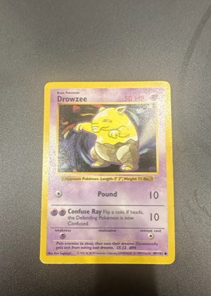 Drowzee, graded 5.5