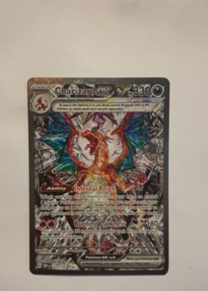 Charizard ex, graded 9.0