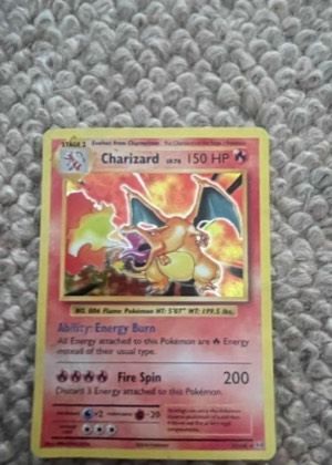 Charizard graded 6 & below