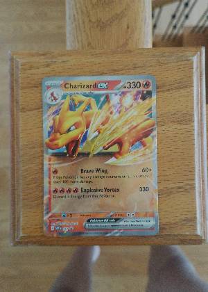 Charizard ex, graded 8.0