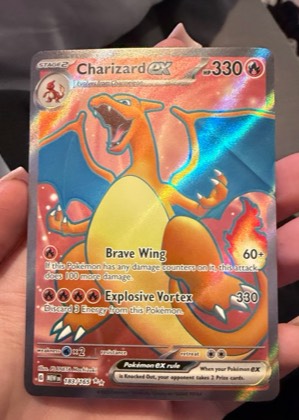 Charizard ex, graded 9.0