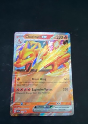 Charizard ex graded 7