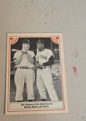 Mickey Mantle and Willie Mays, graded 9.0