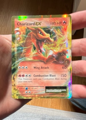 Charizard EX graded 8