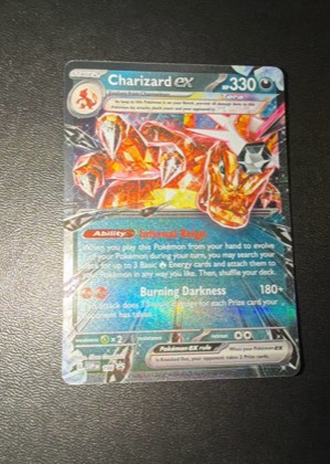 Charizard ex, graded 9.0