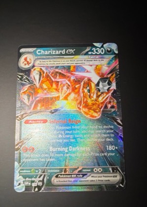 Charizard ex, graded 9.0