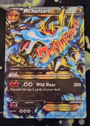 M Charizard EX (X) graded 9