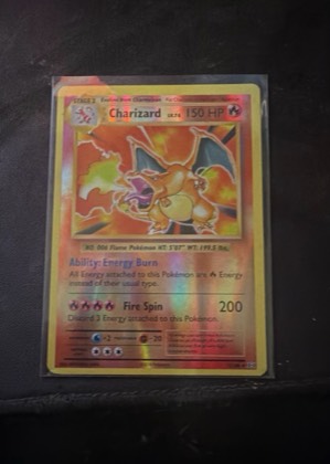 Charizard graded 7