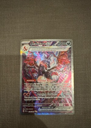 Charizard ex, graded 9.0