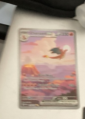 Charizard ex graded 6 & below