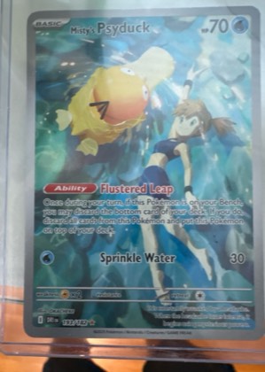 Misty's Psyduck, graded 9.0