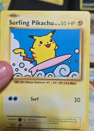 Surfing Pikachu, graded 8.0