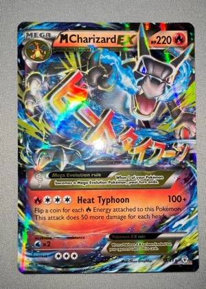M Charizard EX graded 8.5