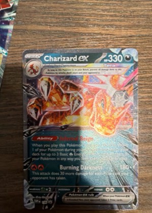 Charizard ex, graded 9.0