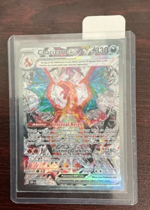 Charizard ex, graded 9.0