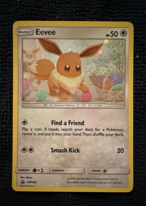 Eevee - SM184 (Cosmos Holo), graded 9.0