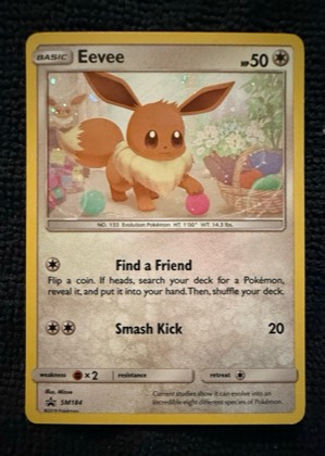 Eevee - SM184 (Cosmos Holo), graded 9.0