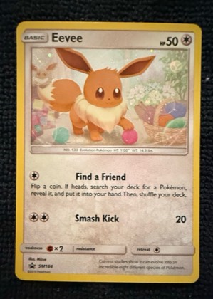 Eevee - SM184 (Cosmos Holo), graded 9.0