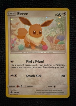 Eevee - SM184 (Cosmos Holo), graded 9.0