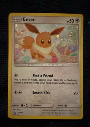 Eevee - SM184 (Cosmos Holo), graded 9.0