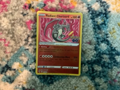 Radiant Charizard graded 8