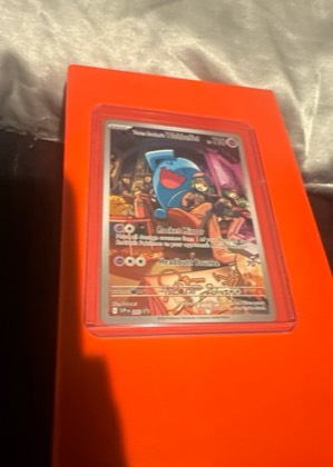 Team Rocket's Wobbuffet graded 8
