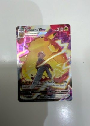 Pikachu VMAX, graded 8.5