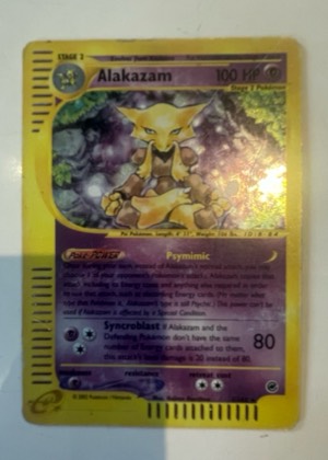 Charizard Star (Delta Species), graded 5.5