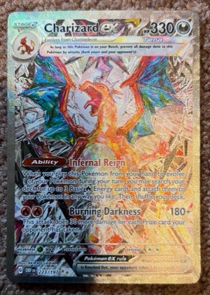 Charizard ex - 223/197 graded 6 & below