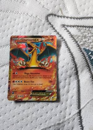 Charizard EX, graded 8.0