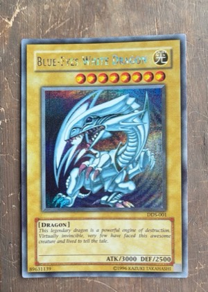 Blue-Eyes White Dragon (Dark Duel Stories), graded 9.0