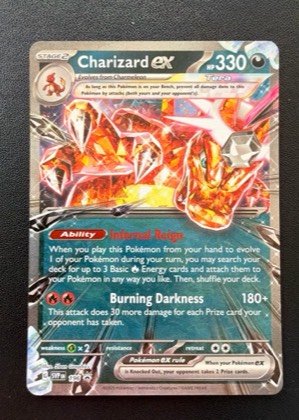 Charizard ex, graded 9.0