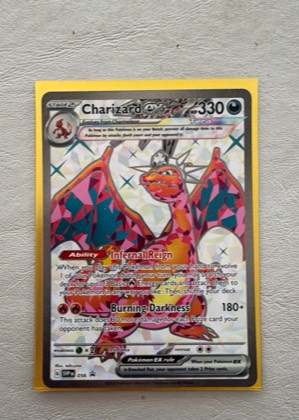Charizard ex, graded 9.0