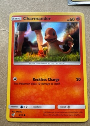 Charmander (Holo Common), graded 9.0