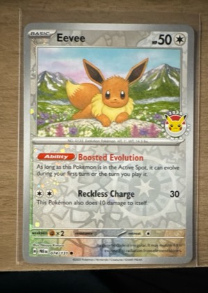 Eevee - 074/131 (Pokemon Day 2025) (Reverse Cosmos Holo), graded 9.0