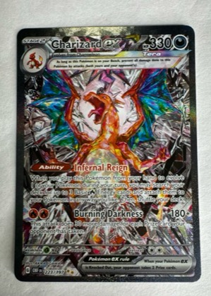 Charizard ex, graded 9.0