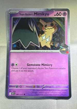 Team Rocket's Mimikyu, graded 9.0
