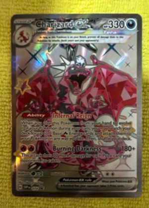 Charizard ex, graded 9.0