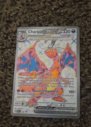 Charizard ex, graded 8.5