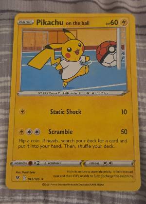 Pikachu on the Ball, graded 9.0