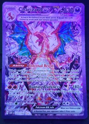 Charizard ex, graded 9.0