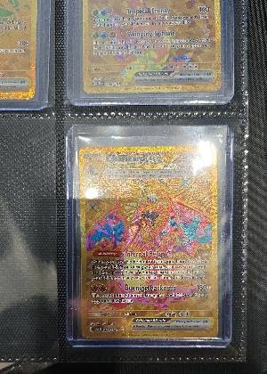 Charizard ex, graded 9.0