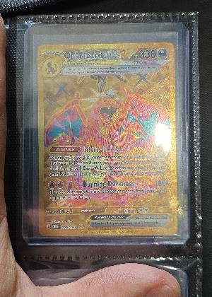 Charizard ex, graded 9.0