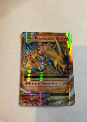 M Charizard EX (Y), graded 8.0