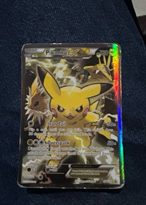 Pikachu EX - XY124, graded 5.5