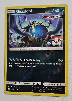 Guzzlord - 80/131 (Pokemon League), graded 9.0