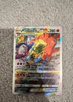 Charizard VSTAR, graded 9.0