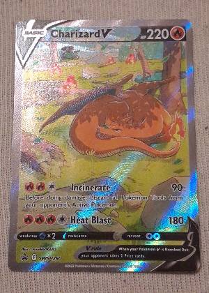 Charizard V graded 8